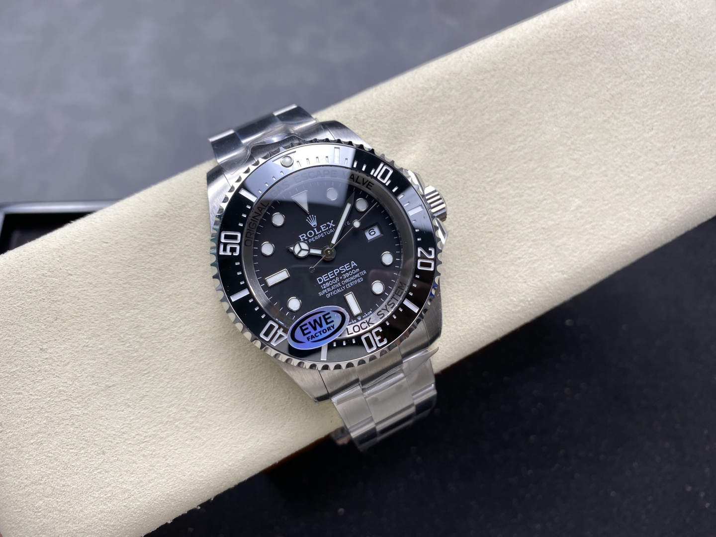 Rolex Deepsea 126660 stainless steel with black dial and ceramic bezel, EWE factory sticker visible