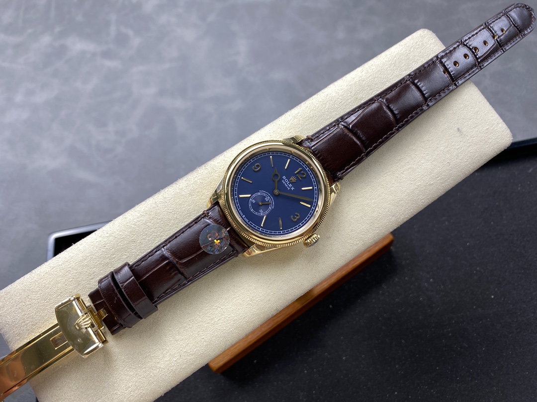 Full view of Rolex 1908 replica with blue dial and brown leather strap on display cushion
