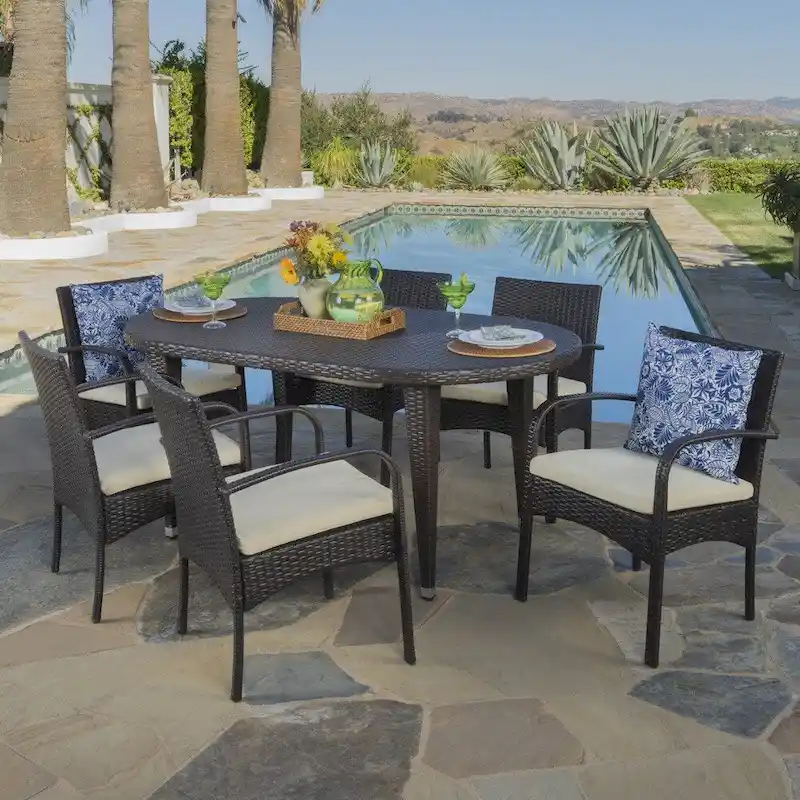 Carter Outdoor 7-piece Oval Wicker Dining Set with Cushions by Christopher Knight Home