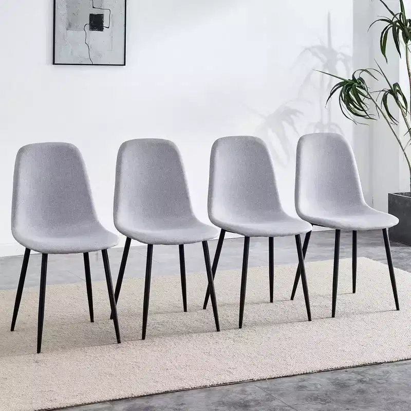 A set of 4 grey fabric-backed and metal combination spoon chairs - a perfect match for minimalist and Scandinavian-style home decor