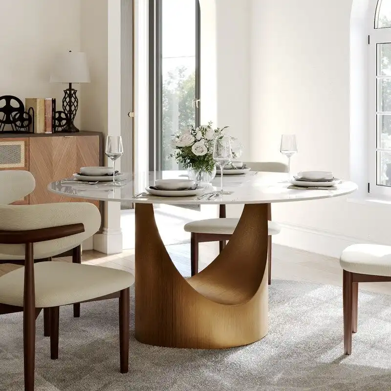 Modern Round Dining Table – White Sintered Stone Top & Bronze Carbon Pedestal