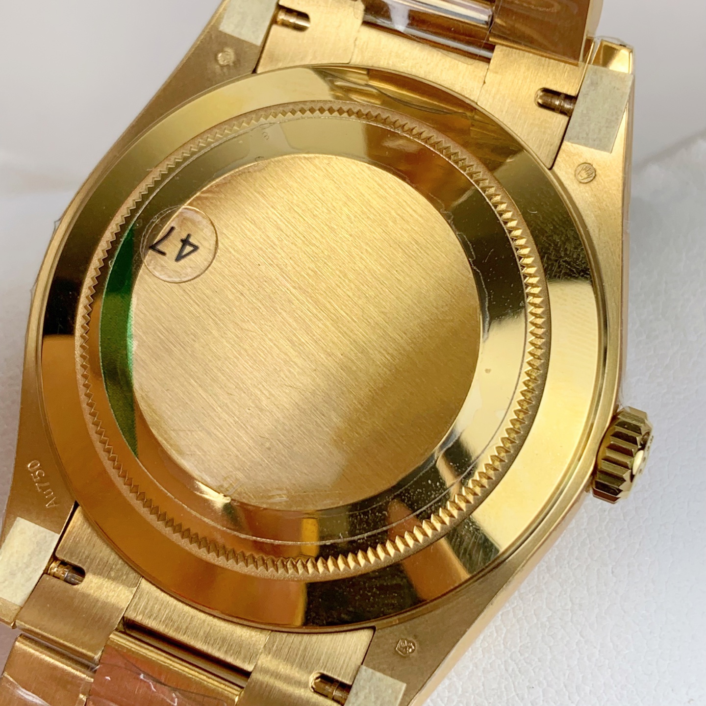 solid caseback of gold day-date clone