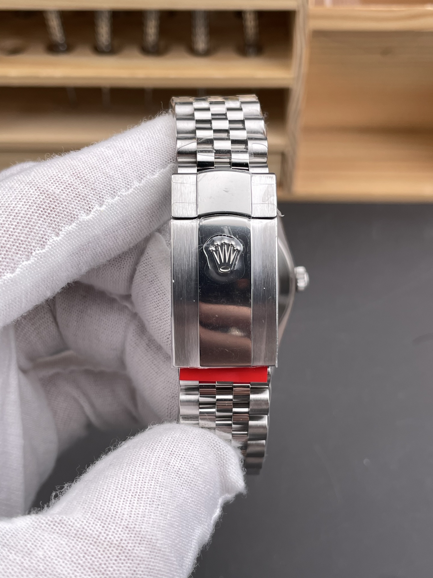 Rolex Datejust super clone clasp exterior with Rolex crown detail on Jubilee bracelet