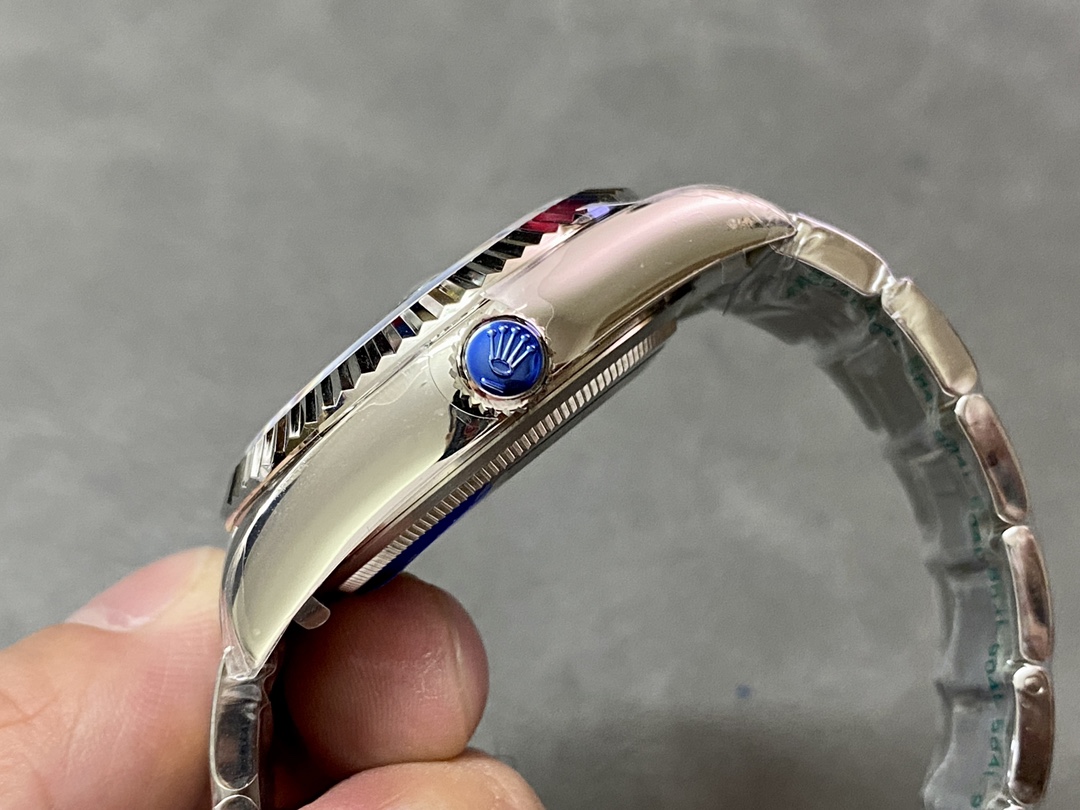 Rolex super clone side view with blue crown
