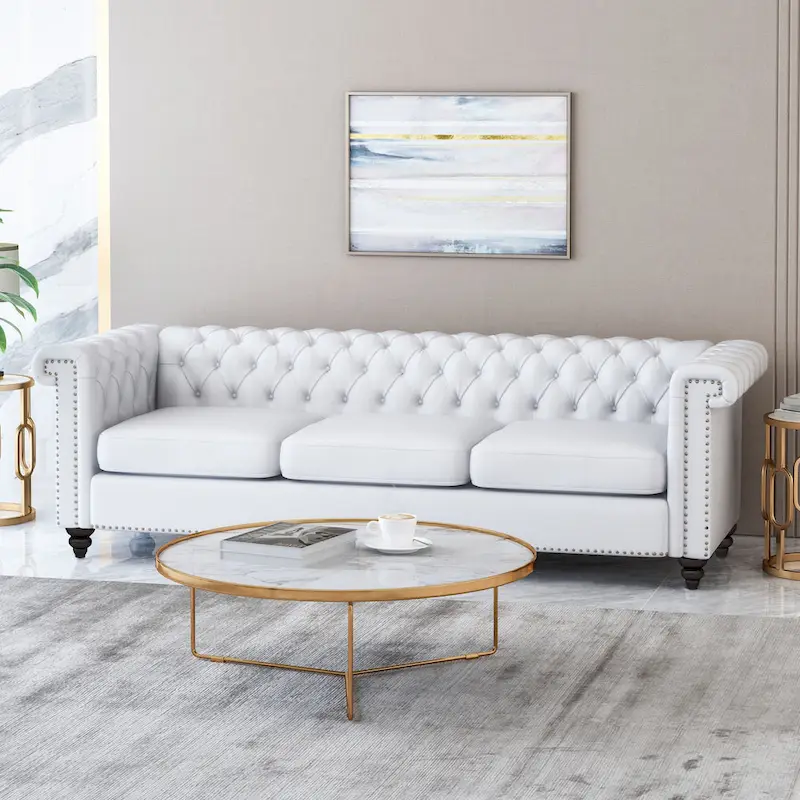 Tufted three-seater sofa