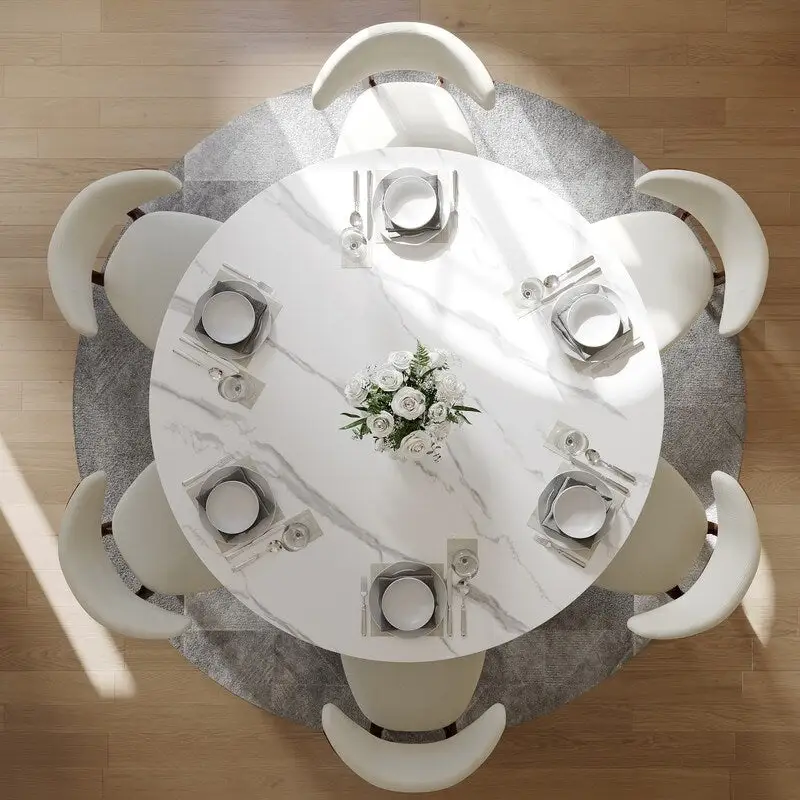 Modern Round Dining Table – White Sintered Stone Top & Bronze Carbon Pedestal