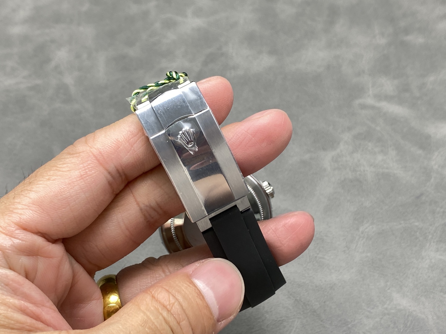 Rolex replica Oysterflex clasp with brushed steel finish and Rolex crown logo