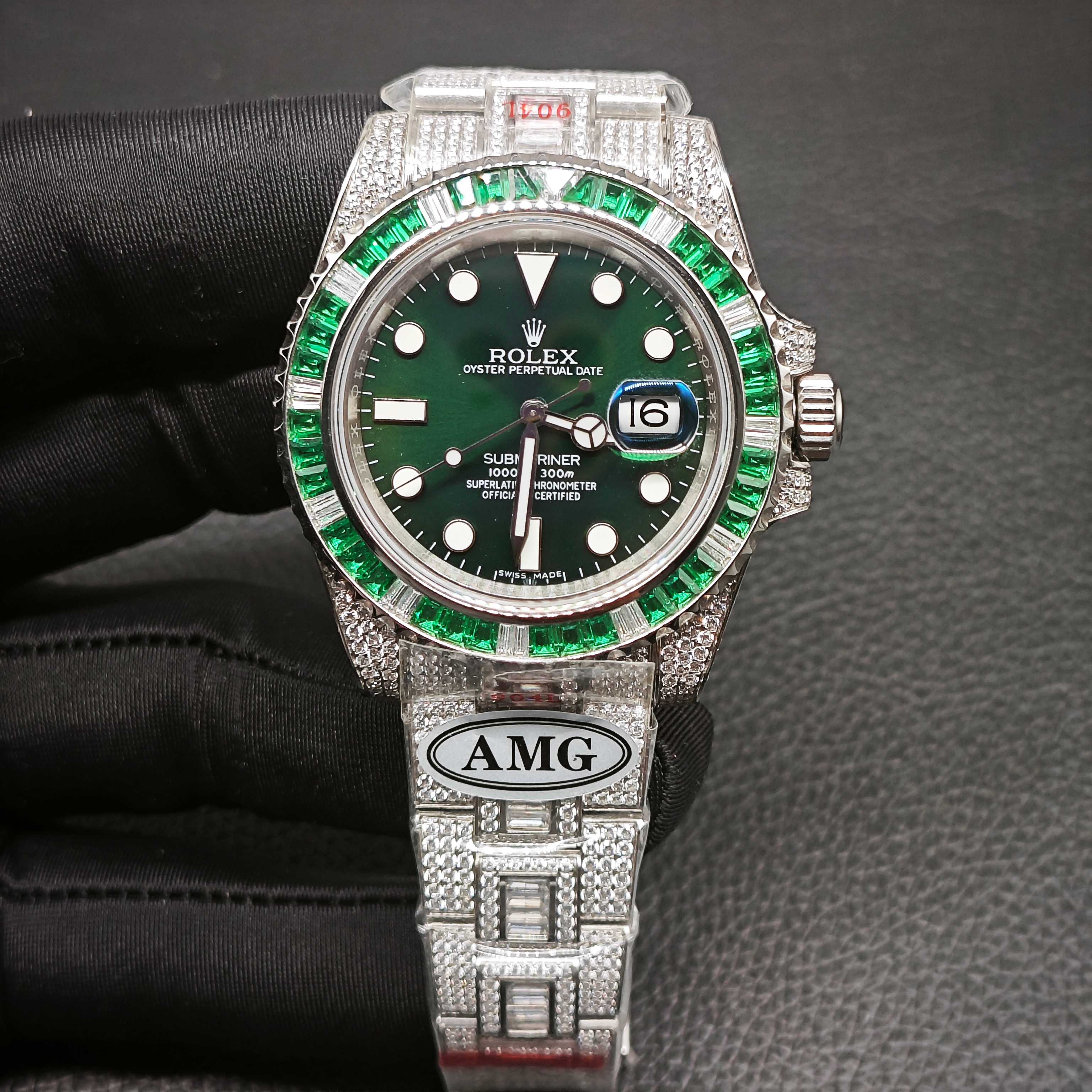 Front view of iced Rolex Submariner super clone with green dial and emerald bezel