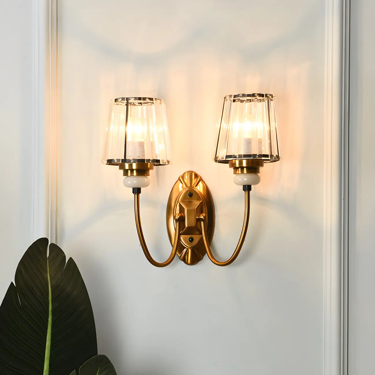Elegant Brass Wall Sconce with Crystal Shade