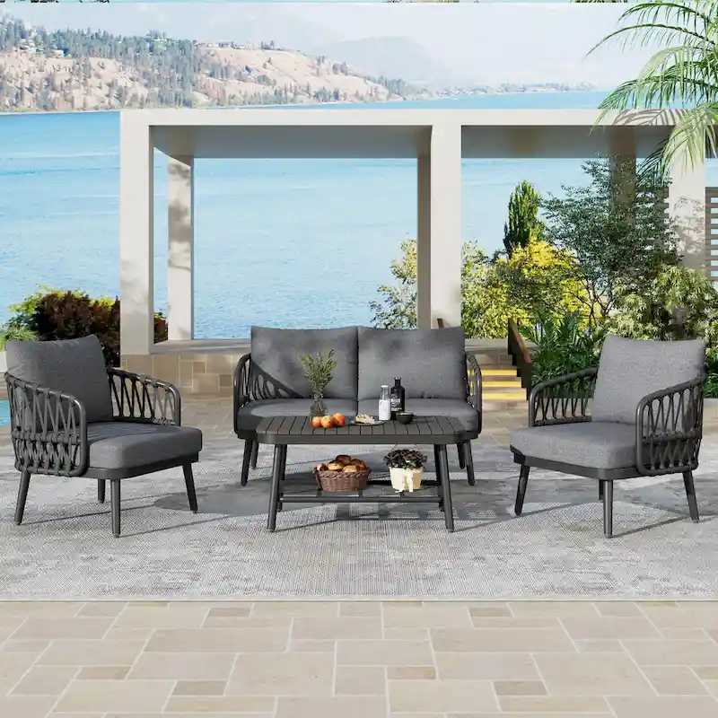 Roomfitters 4-Piece Outdoor Patio Conversation Set with Woven Rope Backrest, Cushions and Metal Frame Chairs