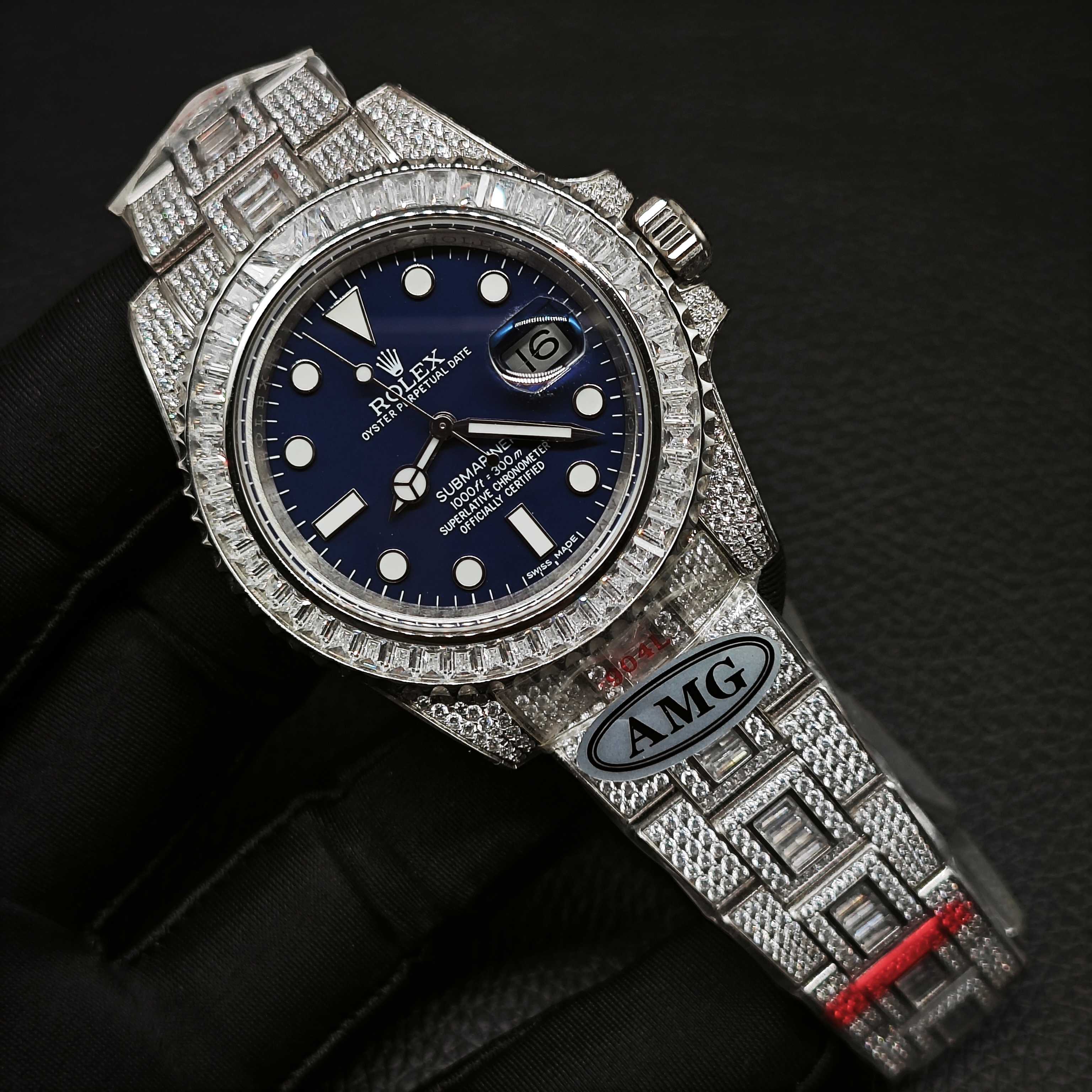 Diamond bezel blue dial Rolex replica watch with iced bracelet