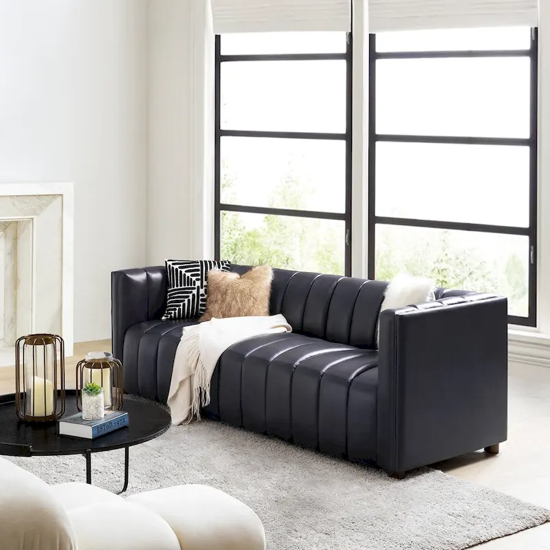 83-inch genuine leather curved sofa with a grooved backrest.