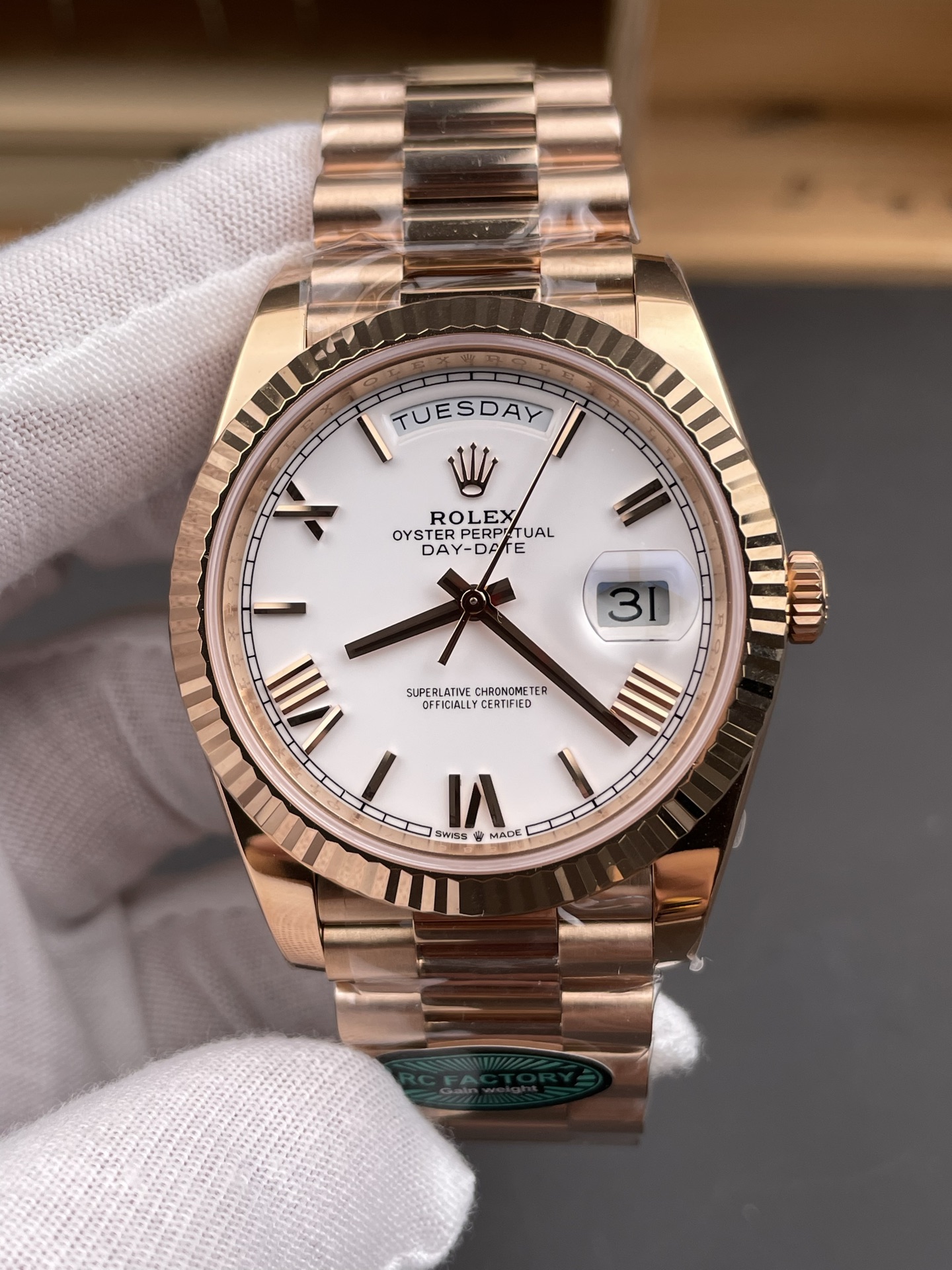 Rose gold Day-Date replica watch front dial with white dial and fluted bezel