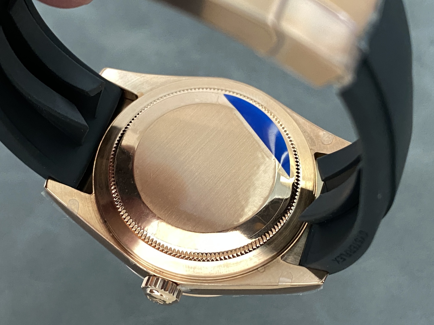 Back of the rose gold Rolex Sky-Dweller replica case with brushed finish and protective elements