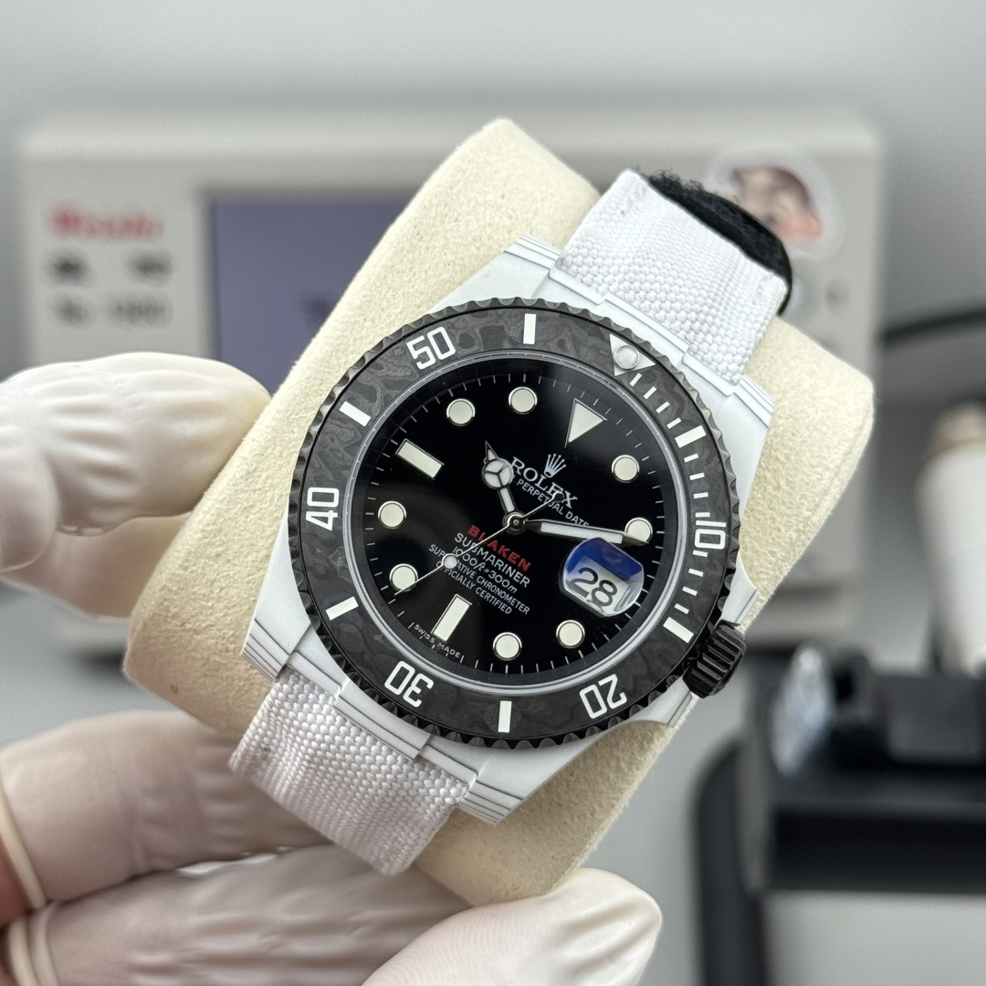 Angled wrist test view of a white Blaken Submariner style fake rolex on fabric strap