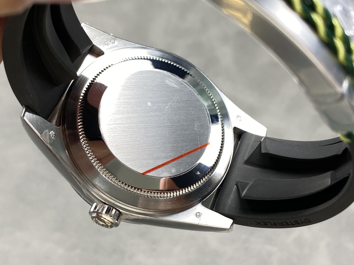 Caseback view of Rolex Sky-Dweller replica showing polished steel back and Oysterflex strap