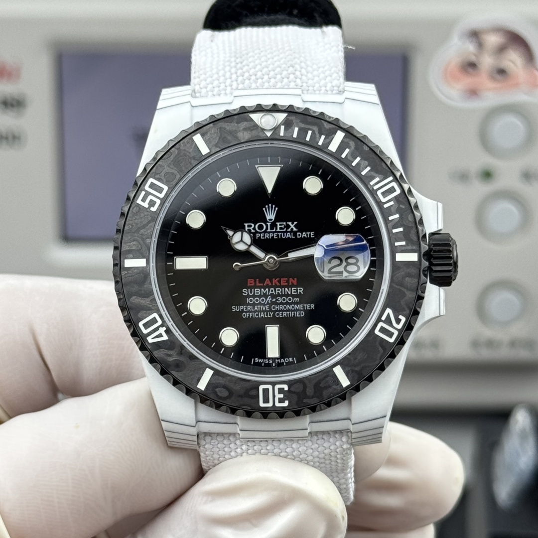 Side profile of a white Submariner style replica rolex showing crown bezel and case thickness
