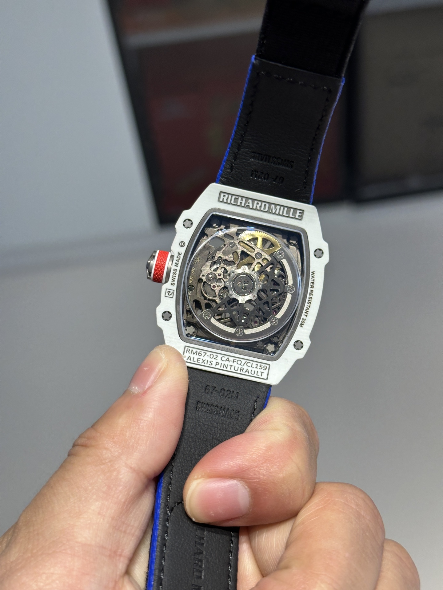 Back view of Replica Richard Mille watch showing skeleton movement and caseback details