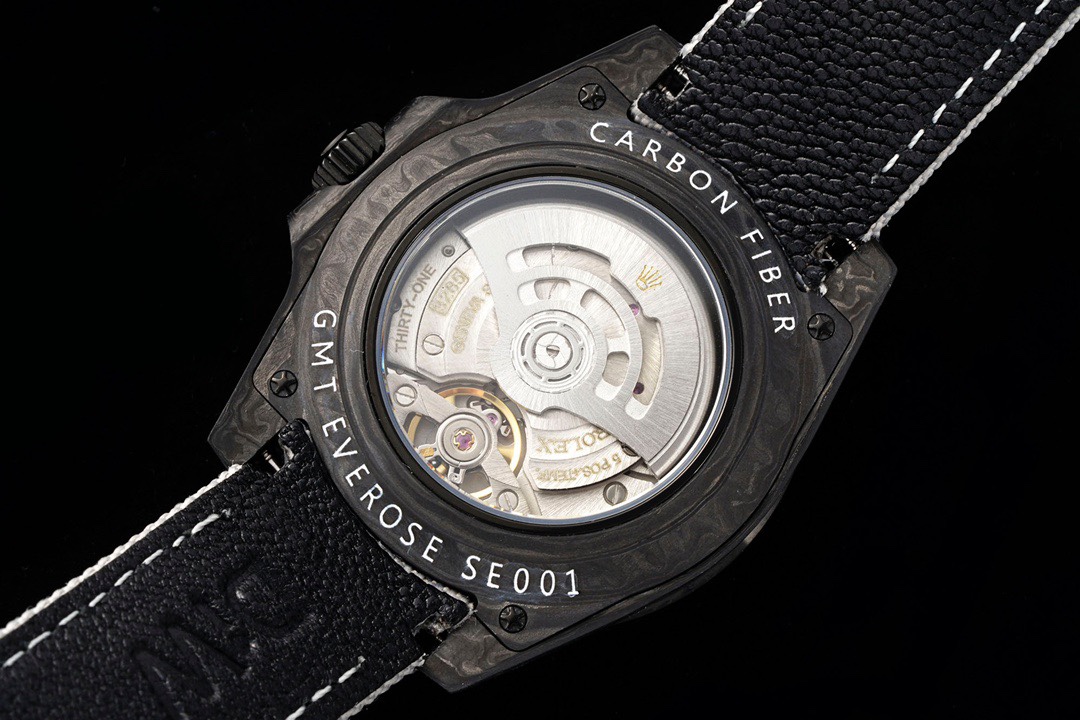 Transparent case back showing Dandong 3285 clone movement and carbon fiber case