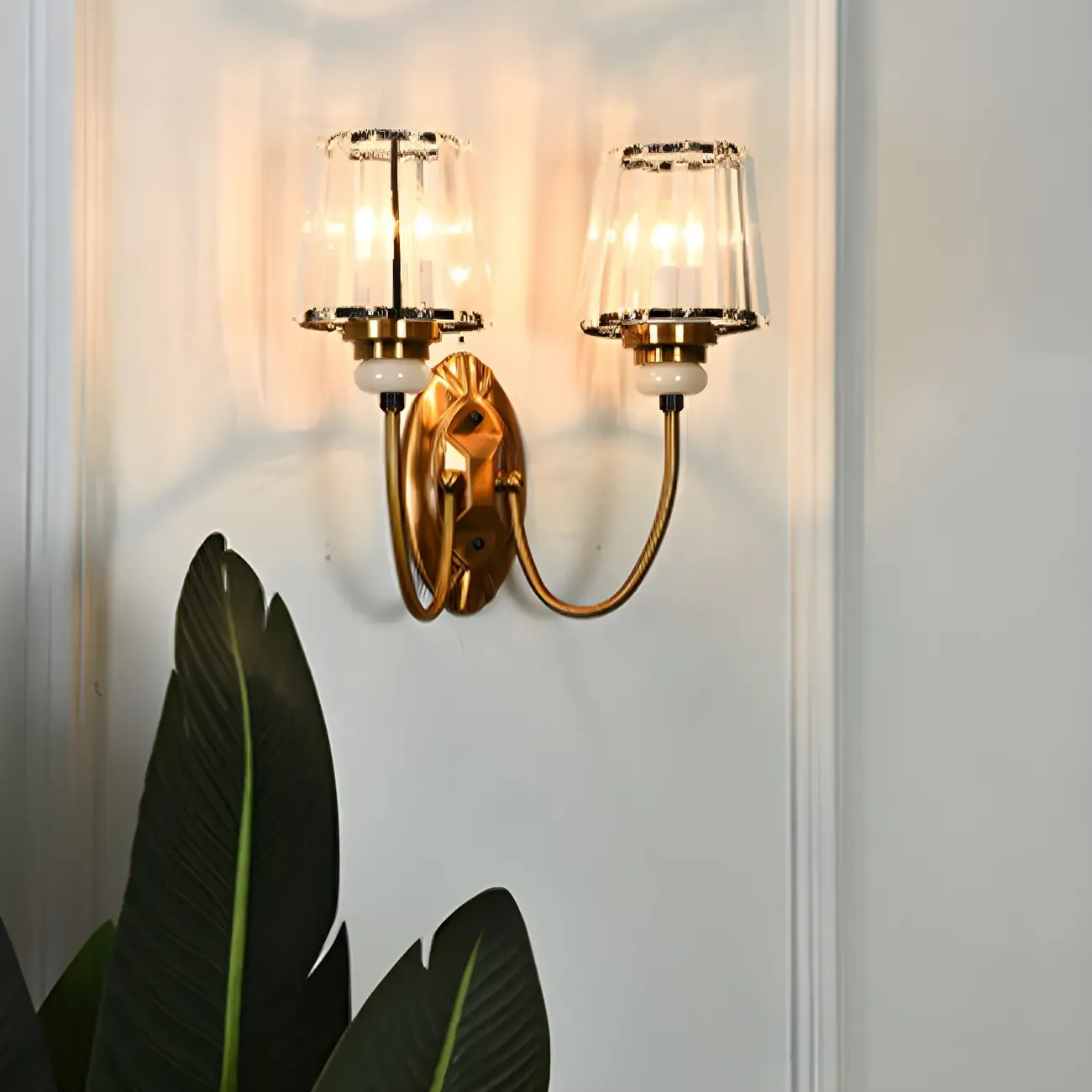 Elegant Brass Wall Sconce with Crystal Shade