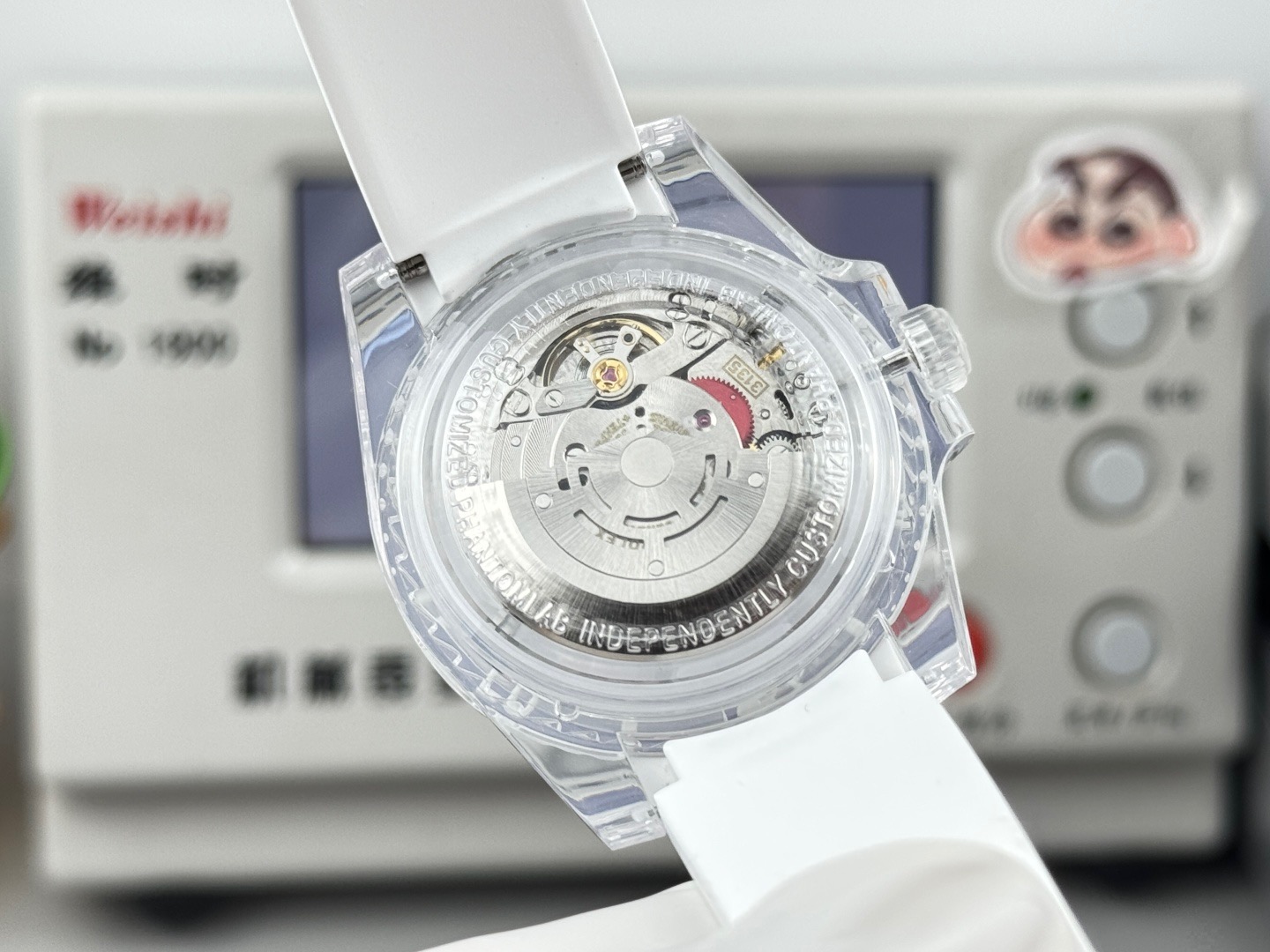 Exhibition case back showing the 3135 clone movement inside a transparent watch