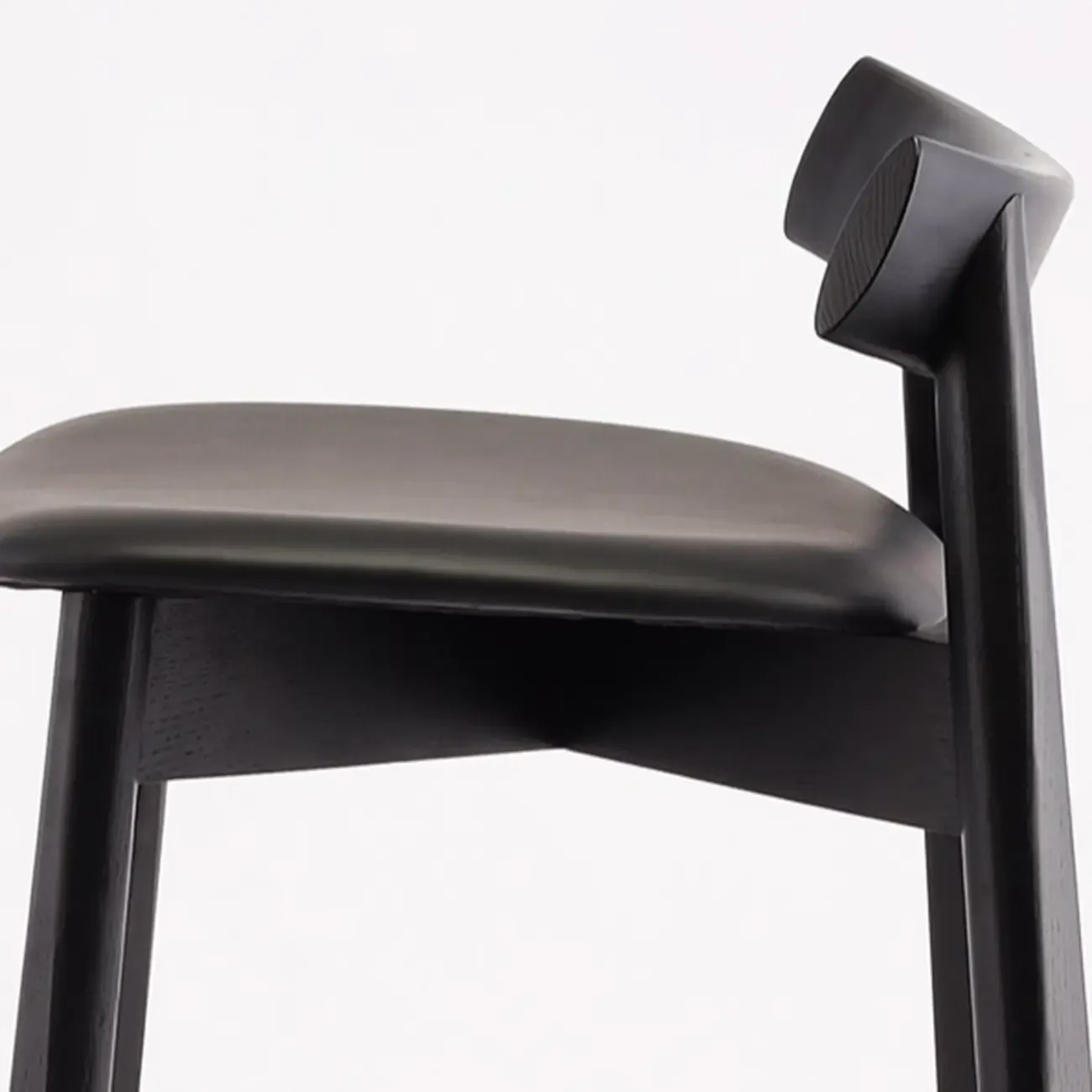 Modern Black Ash Upholstered Saddle Bar Stools