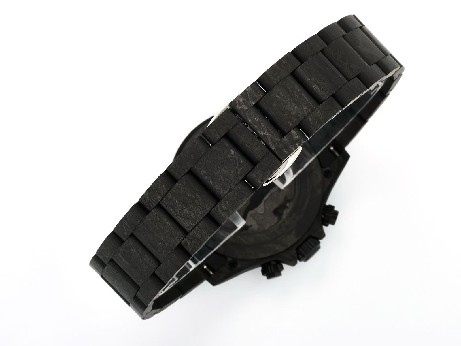 Replica Daytona carbon fiber bracelet and case profile on display stand