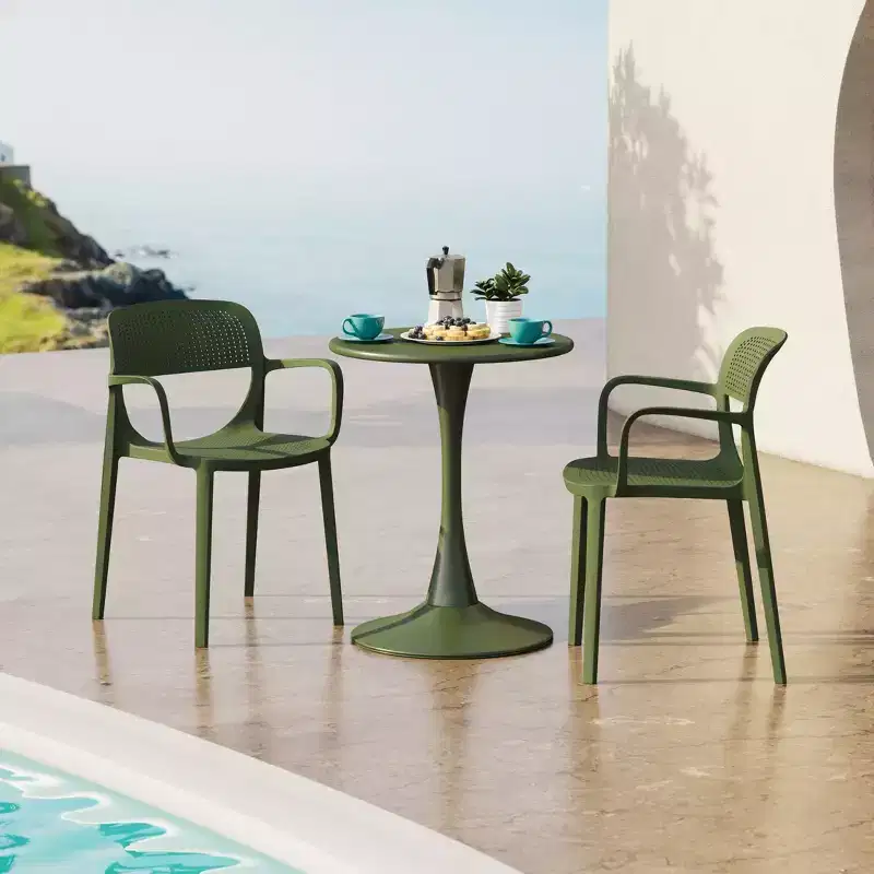 WestinTrends Playa 3-Piece Round Metal Bistro Dining Table Set And Stackable Resin Patio Dining Arm Chairs