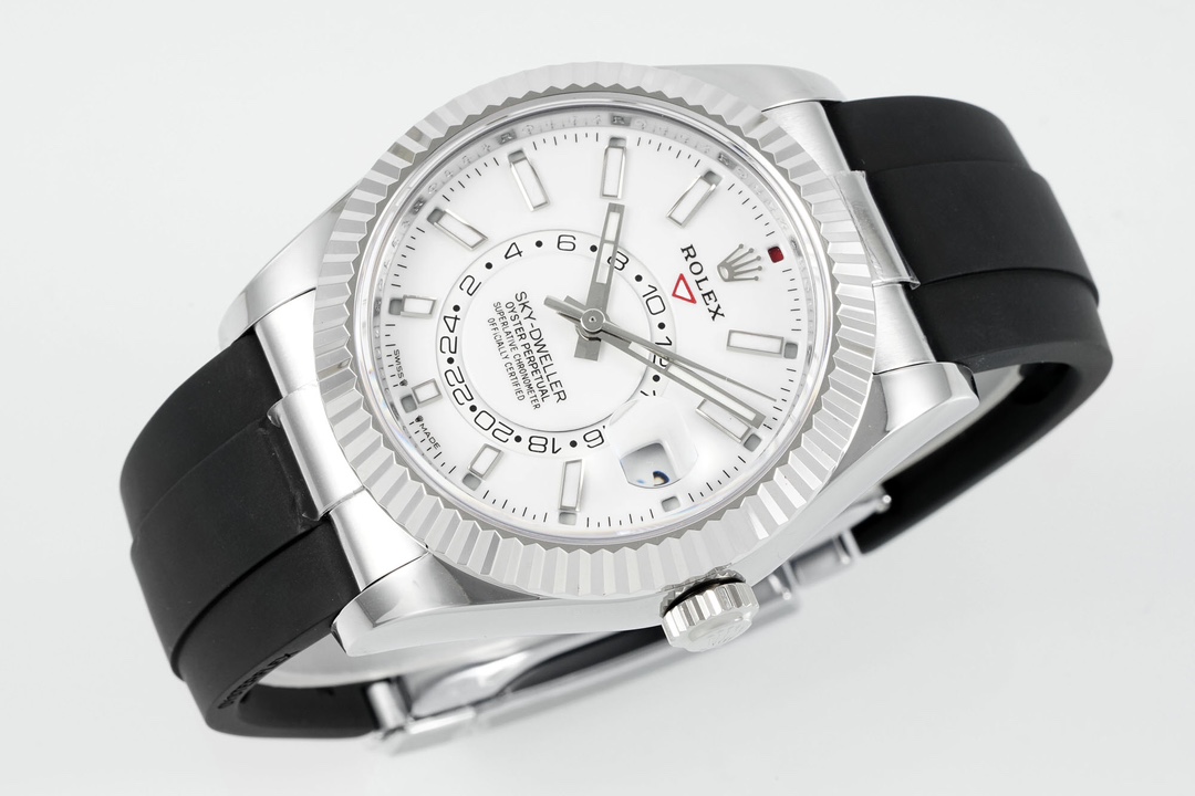 Close-up dial detail of replica Rolex Sky-Dweller showing 24-hour sub-dial, date cyclops, and hands