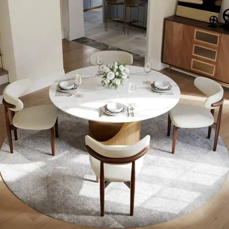 Modern Round Dining Table – White Sintered Stone Top & Bronze Carbon Pedestal