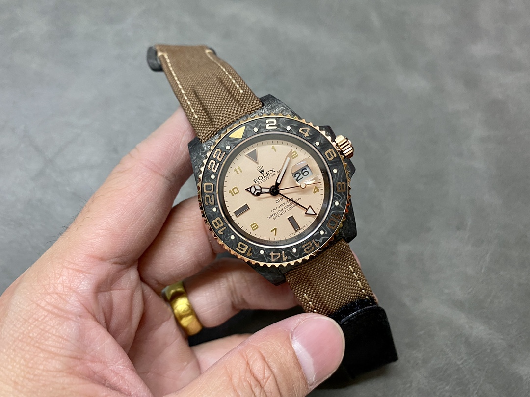 Master quality fake Rolex GMT-Master II carbon case bronze bezel sand dial on wrist with fabric strap