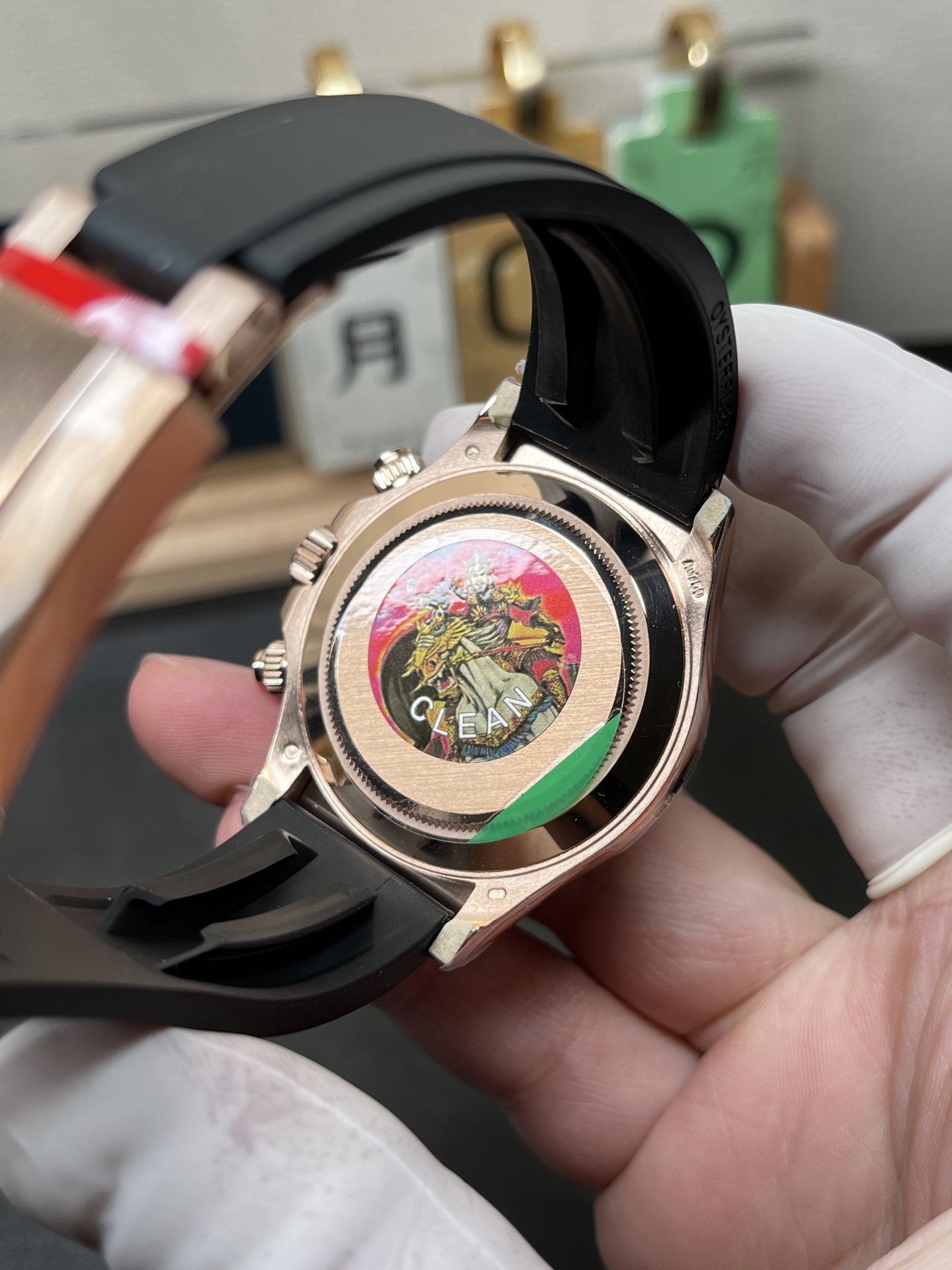 Clean factory 4131 Daytona replica caseback and black rubber strap underside