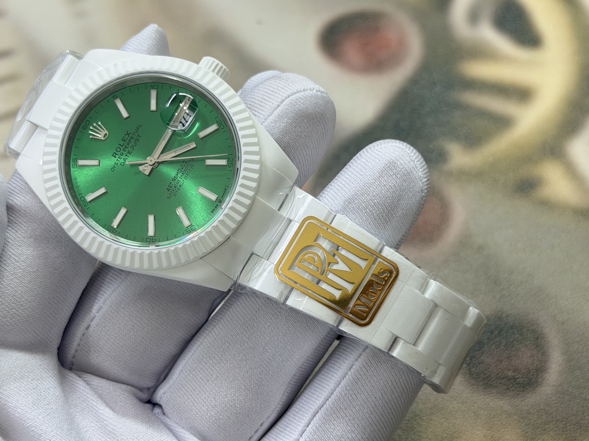 Rolex Datejust 41 replica with green dial and VS3235 movement on white glove