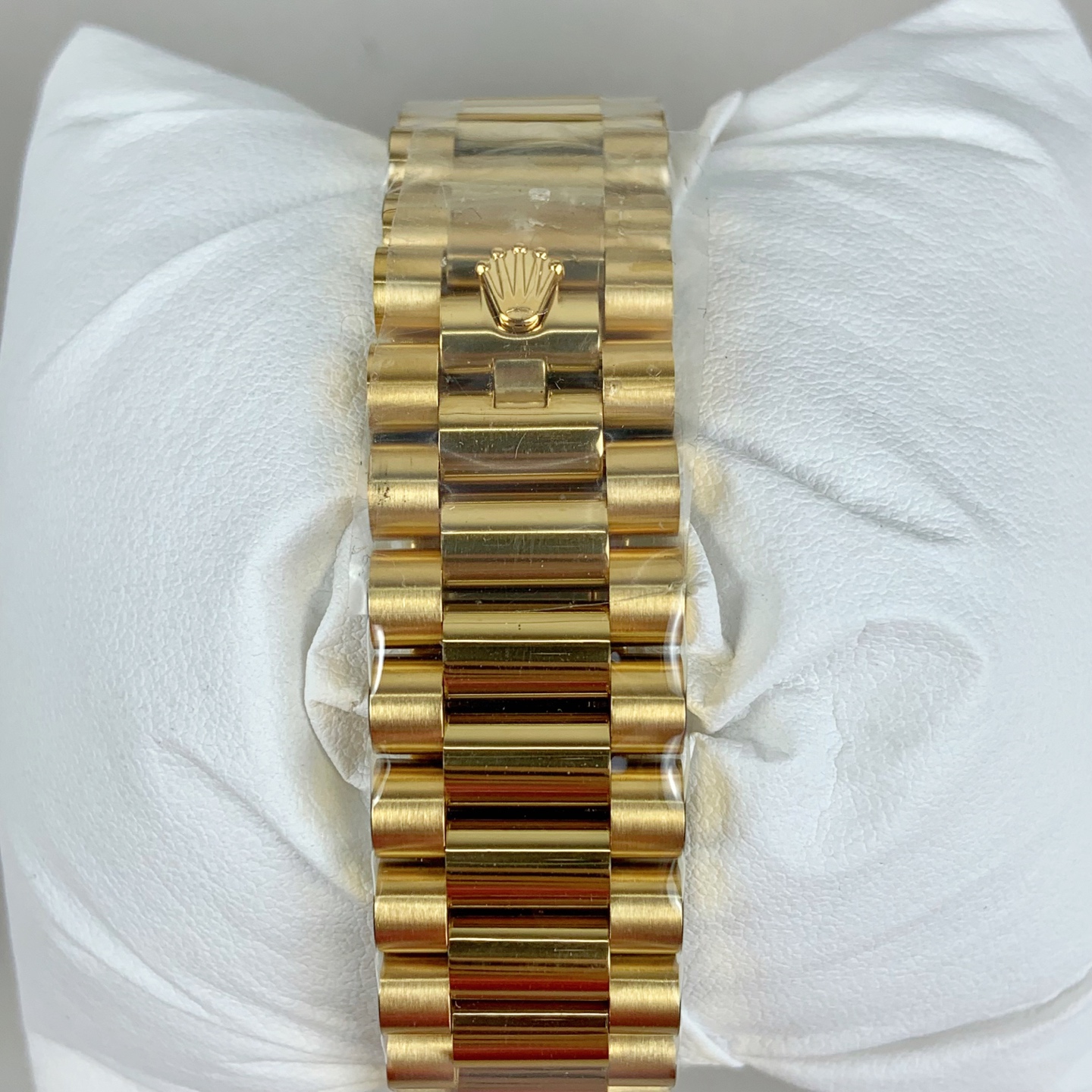 gold president bracelet with crown logo