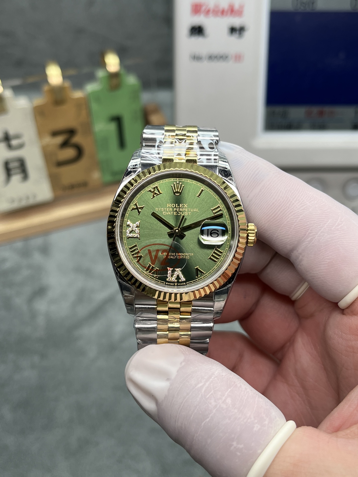 Rolex Datejust replica olive green dial gold bezel two-tone Jubilee bracelet