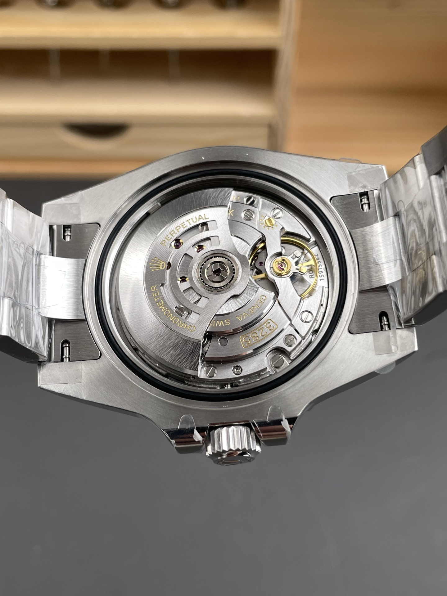 Rolex GMT-Master II replica 3285 movement view with engraved rotor and automatic winding system