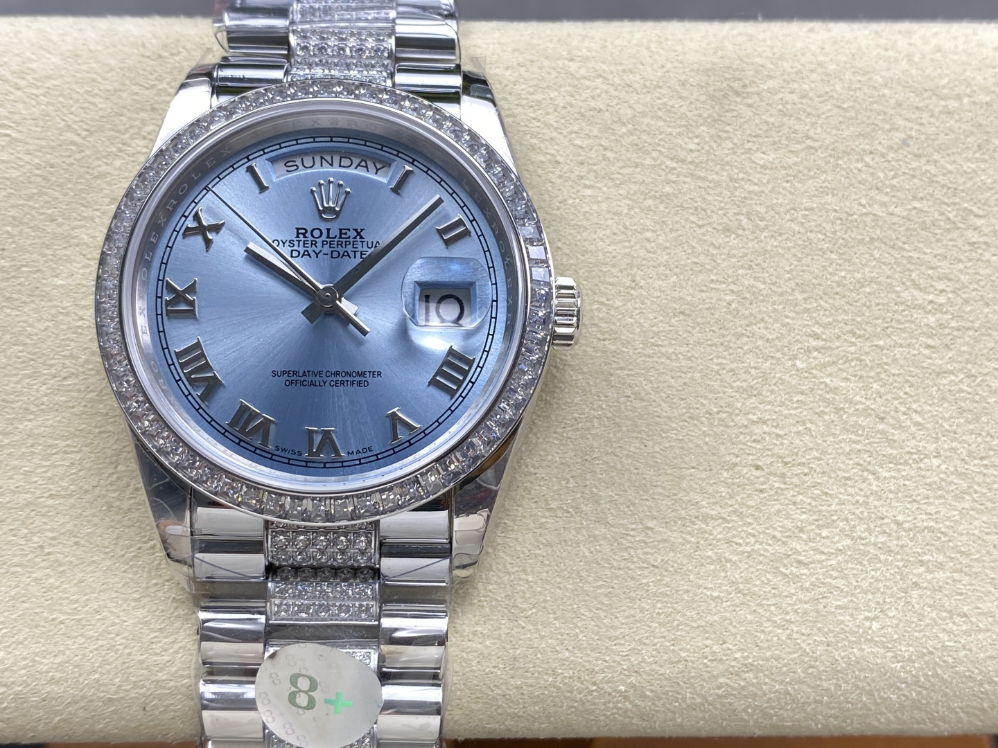 Rolex Day-Date ice blue dial with diamond bezel and Roman numerals front view