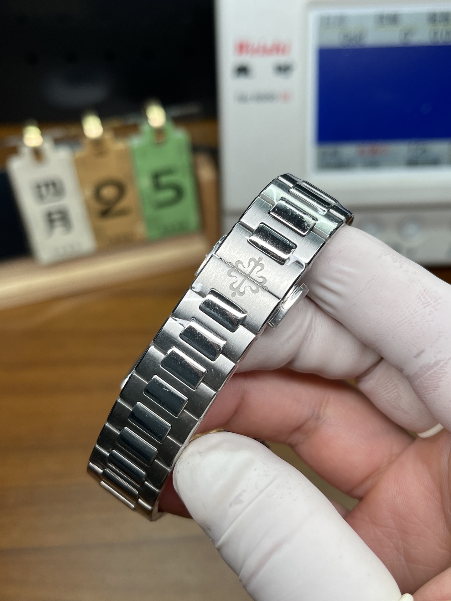 Patek Philippe Nautilus replica bracelet clasp and engraved folding buckle detail