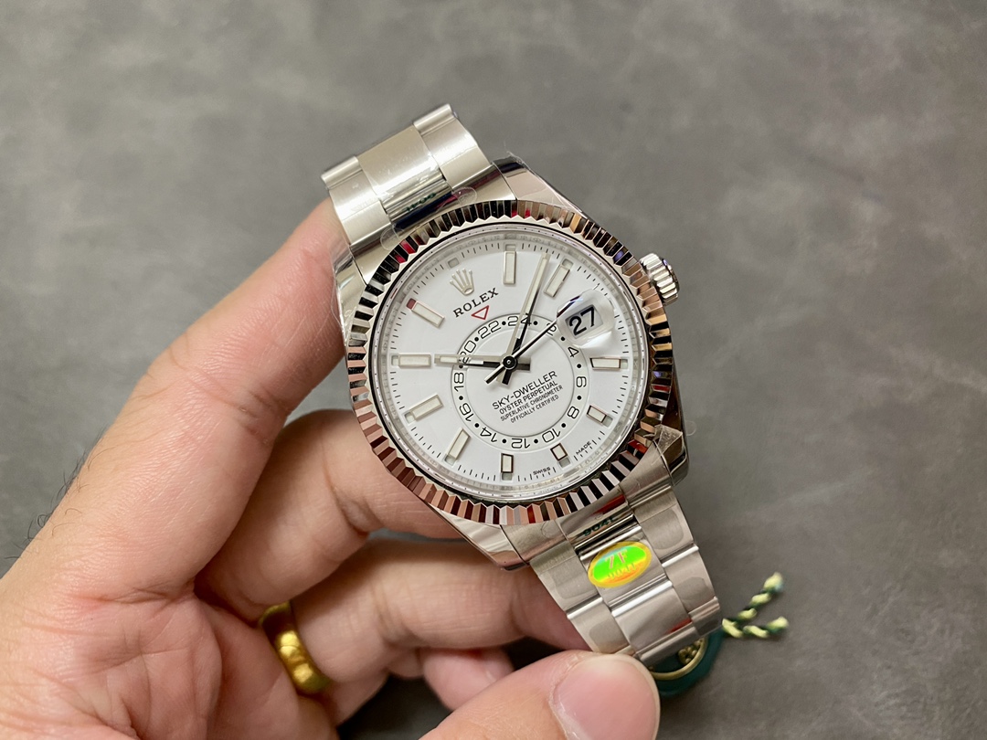 Angled view of a super clone Rolex Sky-Dweller showing the polished case and Jubilee style bracelet