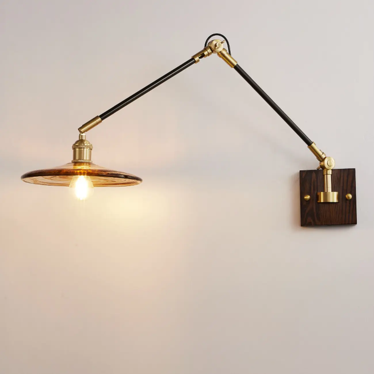 Industrial Amber Swing Arm LED Wall Sconce with Glass Shade