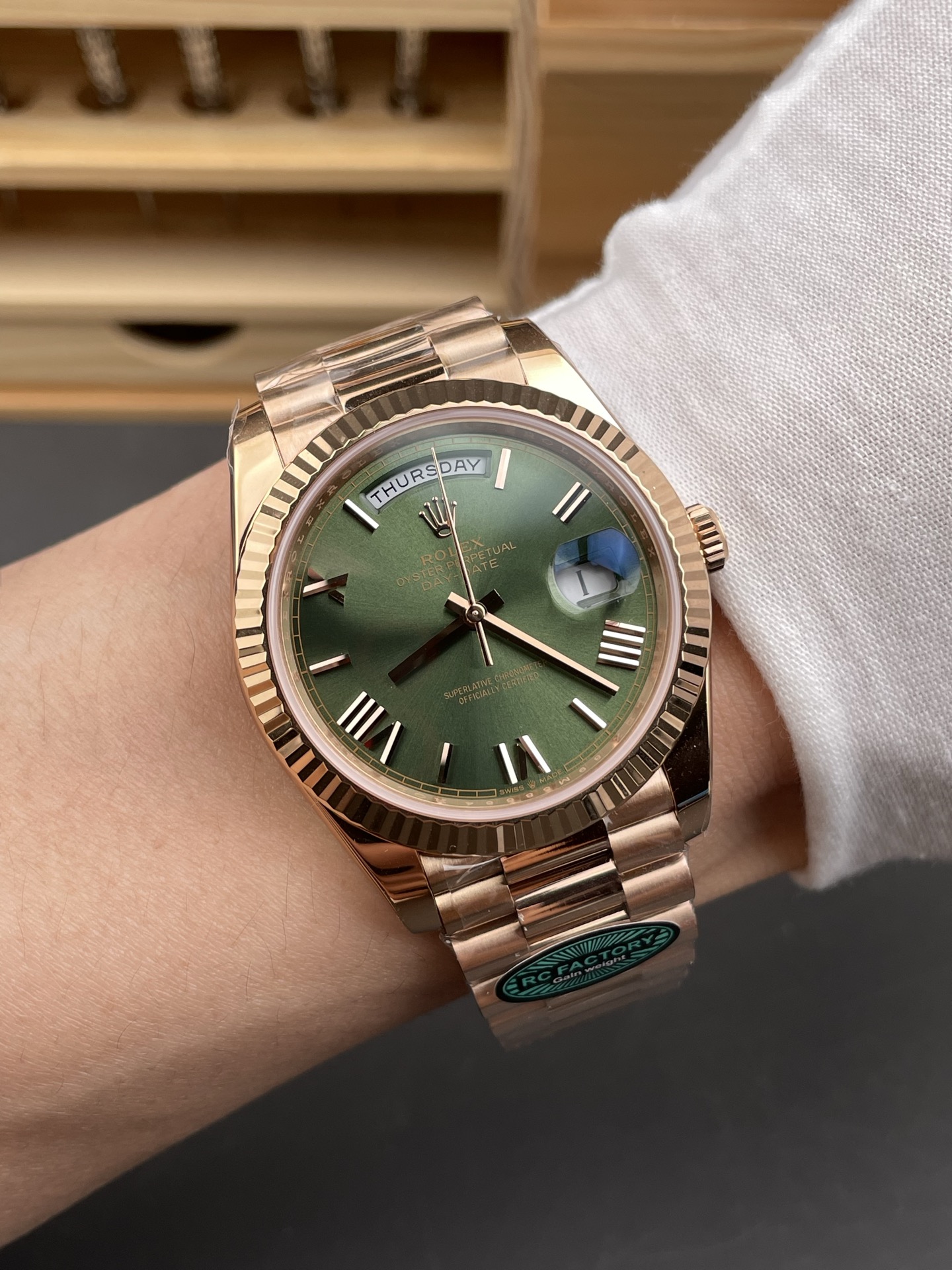 Rose gold Rolex Day-Date super clone green dial on wrist