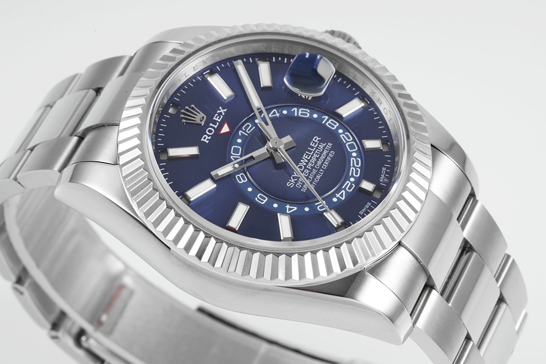 Close-up macro view of Rolex Sky-Dweller blue dial with 24-hour track, hands, and date window