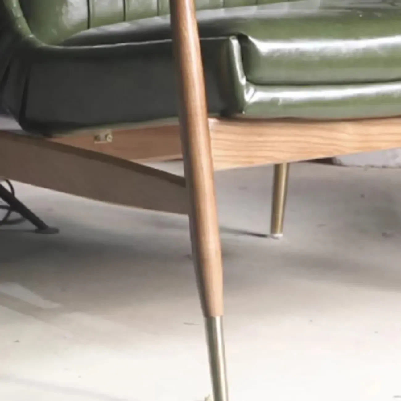 Modern Green Leather Armchair with High Back Design