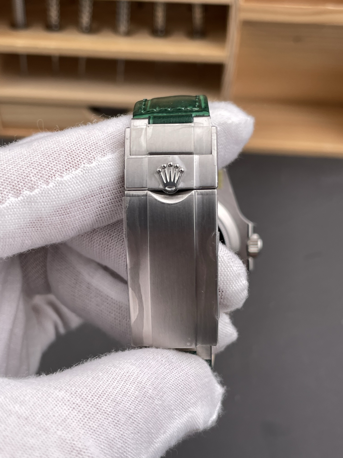 Green Rolex Submariner replica clasp close-up