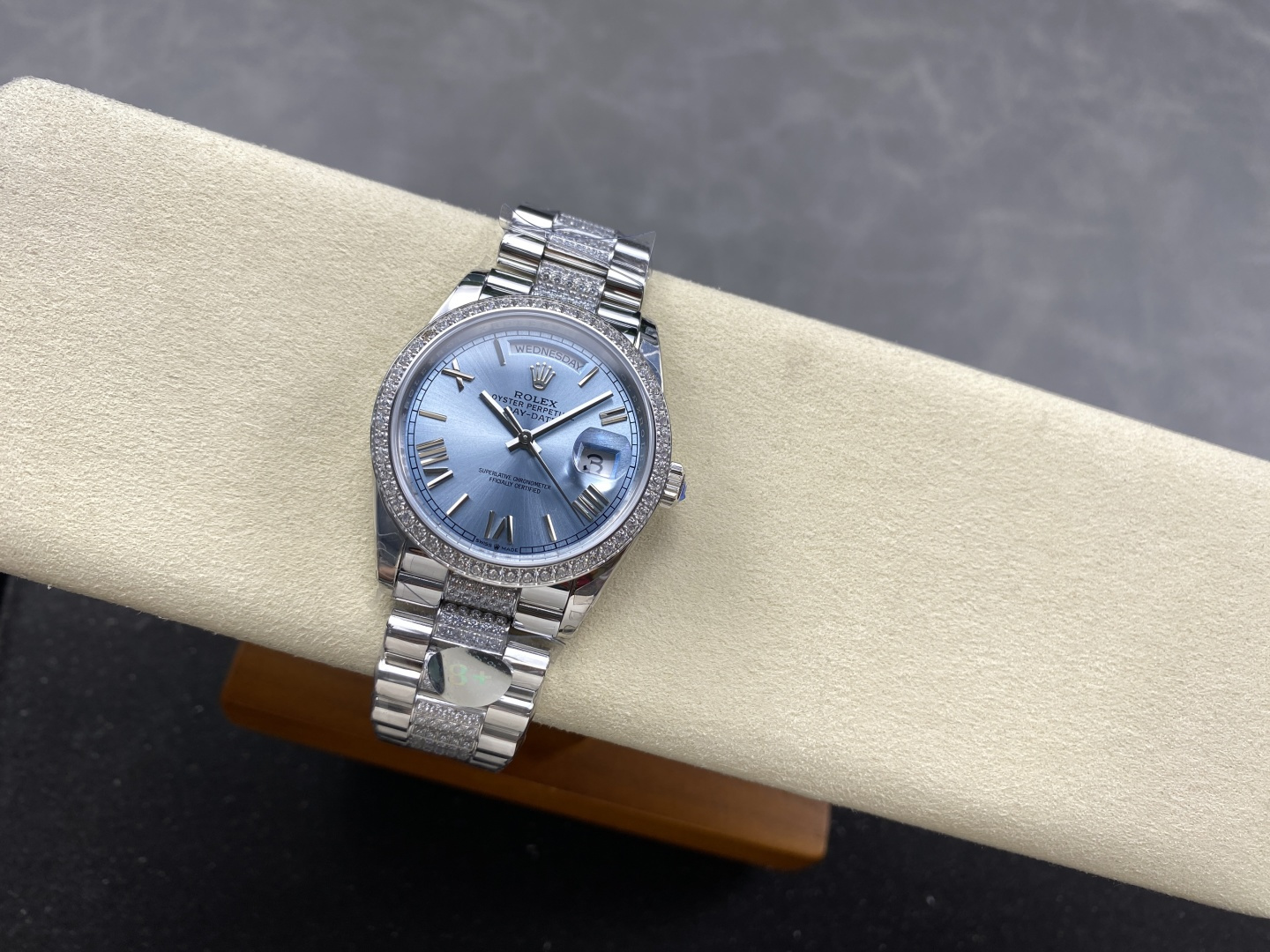 Luxury replica Rolex Day-Date 40 overall view on cream cushion