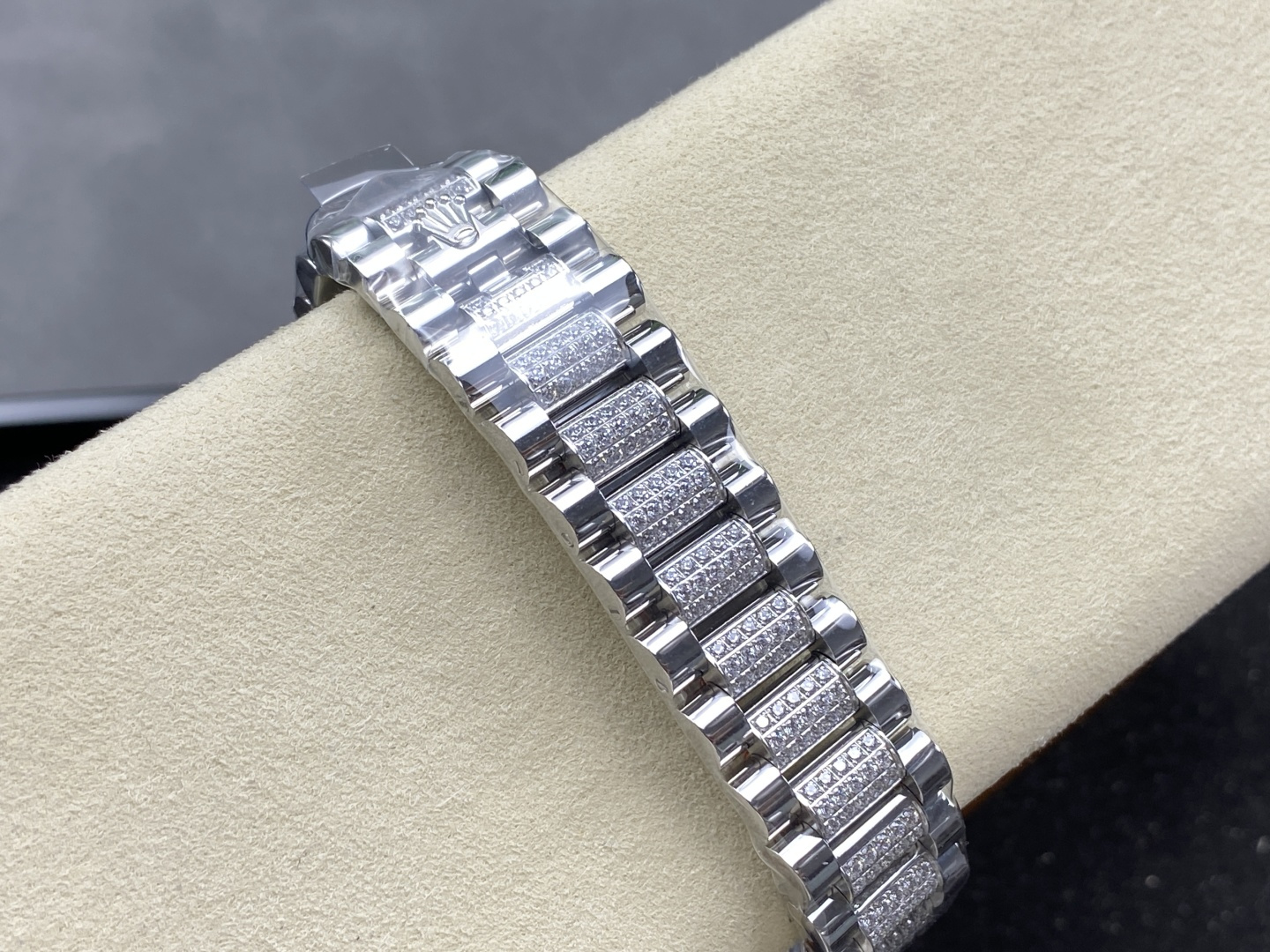 Close-up of diamond-set President bracelet with Rolex crown clasp