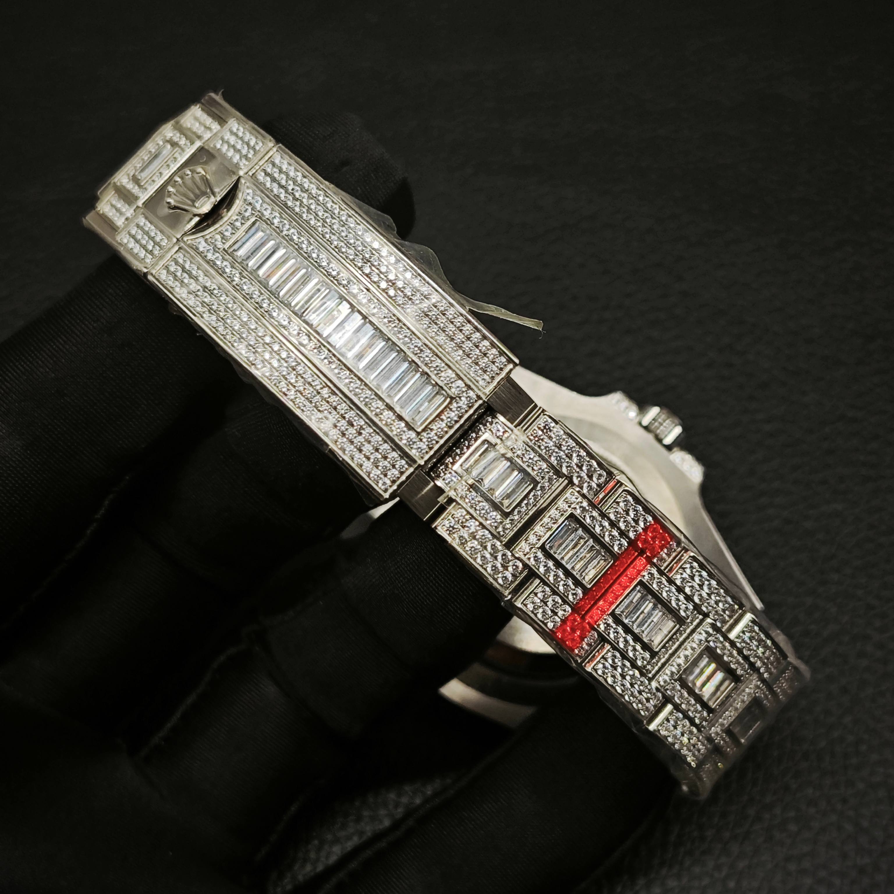 Iced Rolex super clone bracelet detail with baguette stones and polished clasp