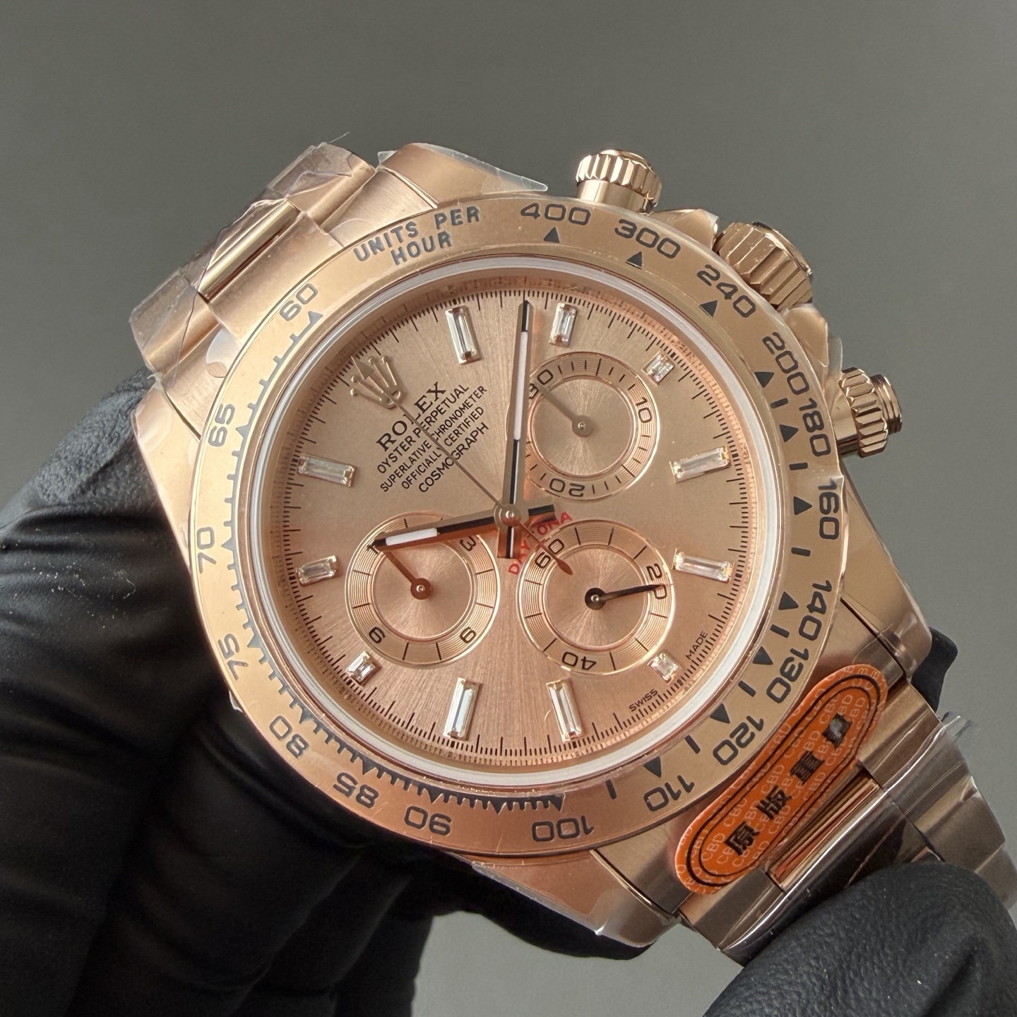 Rose gold Rolex Daytona 1:1 clone with diamond markers and protective stickers high precision replica