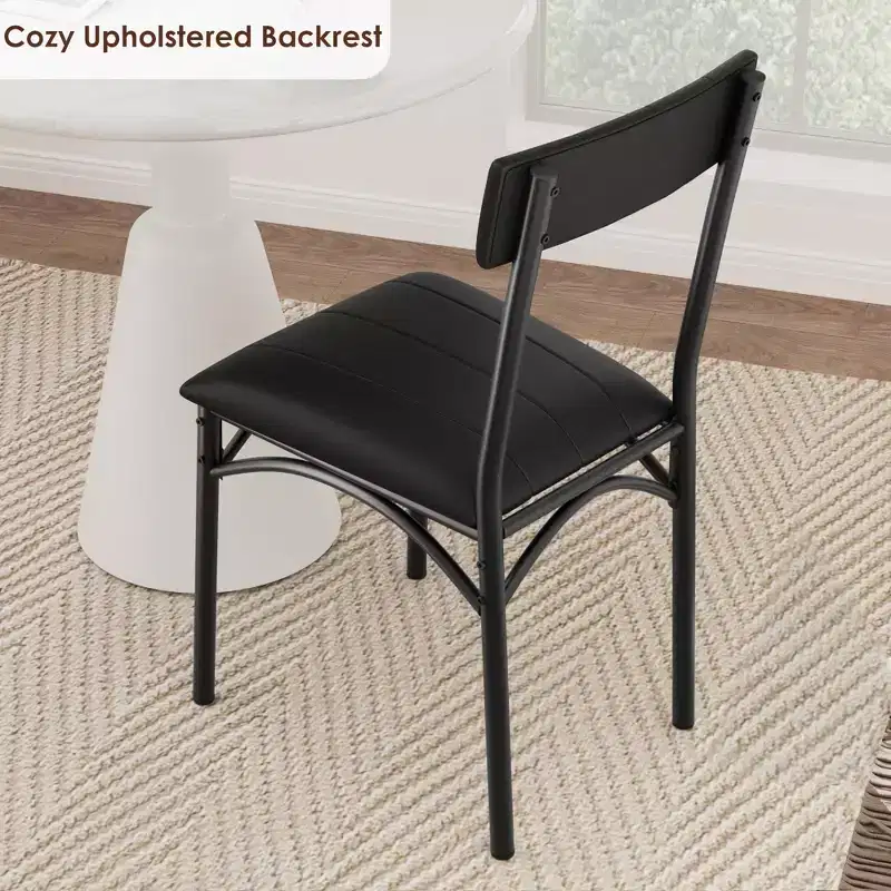 Four dining chair sets, with soft cushions and ergonomic high backs. Strong steel legs, suitable for dining rooms and kitchens. Black color.