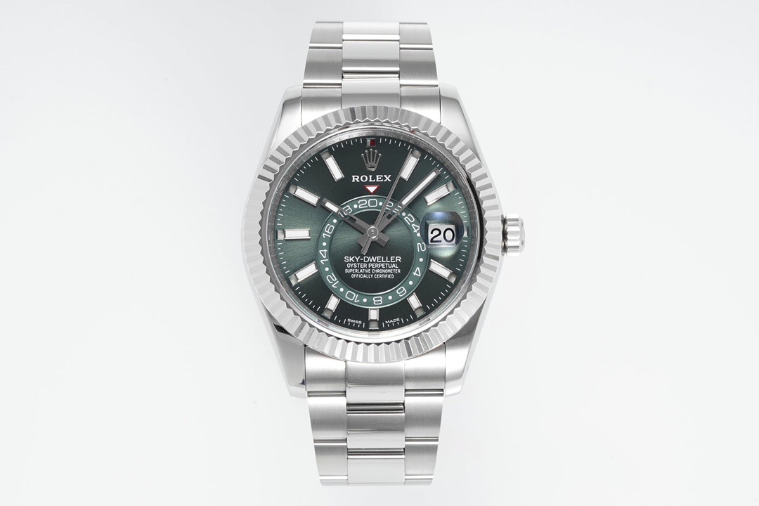 Front view of high quality replica Rolex Sky-Dweller with deep green sunburst dial, 24-hour ring, and polished Oyster bracelet